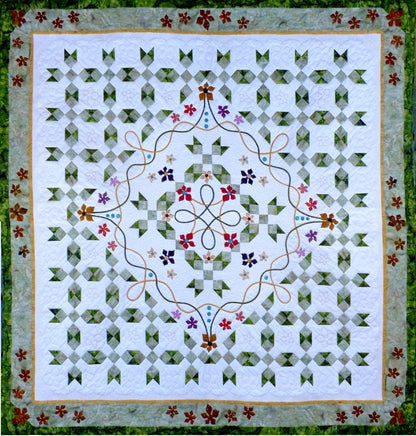 Celtic quilt pattern by Ruth Blanchet includes patchwork background and applique