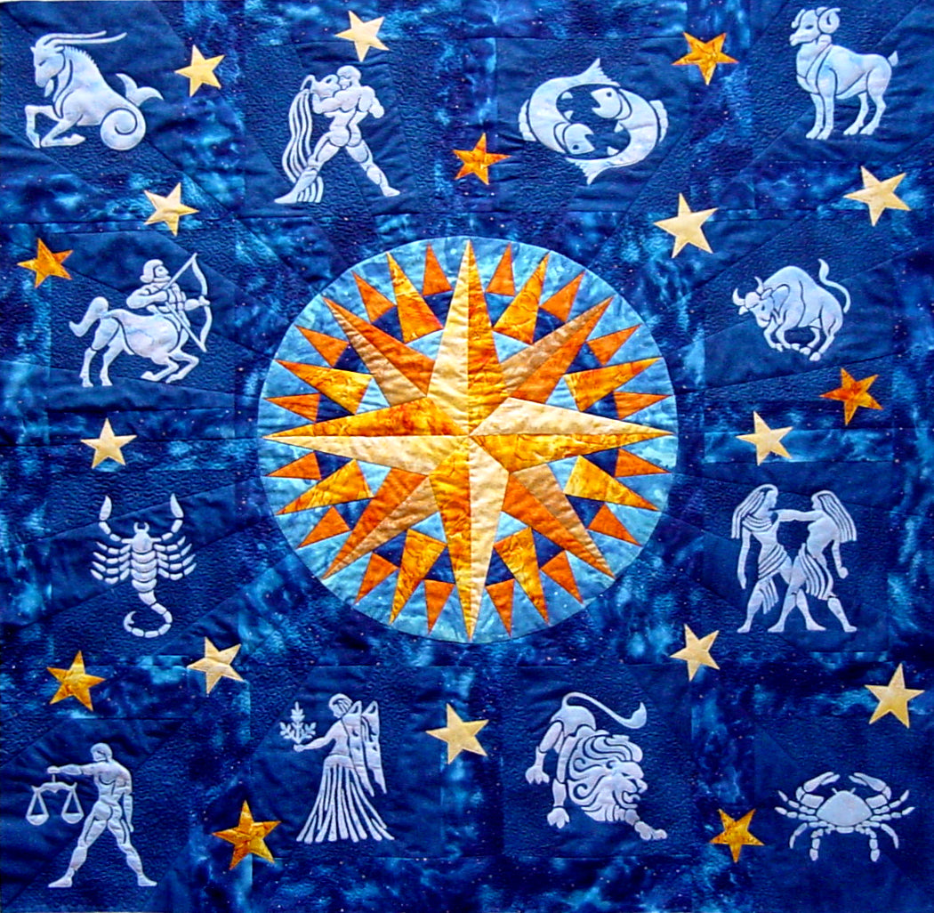 quilt pattern with zodiac applique designs and mariner's compass block. Downloadable pattern by Ruth Blanchet