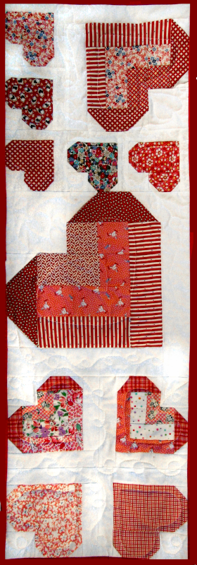 patchwork of folded ribbon hearts table runner pattern by Anita Eaton - download pattern available