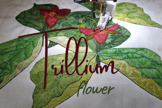 Trillium flower block in progress of making by adding stitching to add detail to leaves