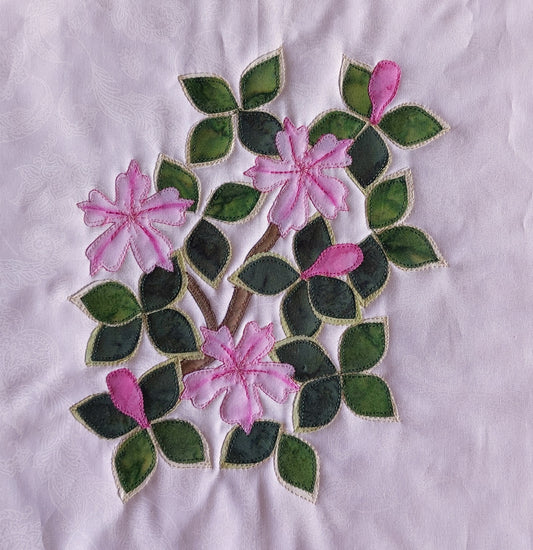 Snowrose flower block with two tone leaves, painted and stitched flowers plus buds using Hoffman Fabric water colors