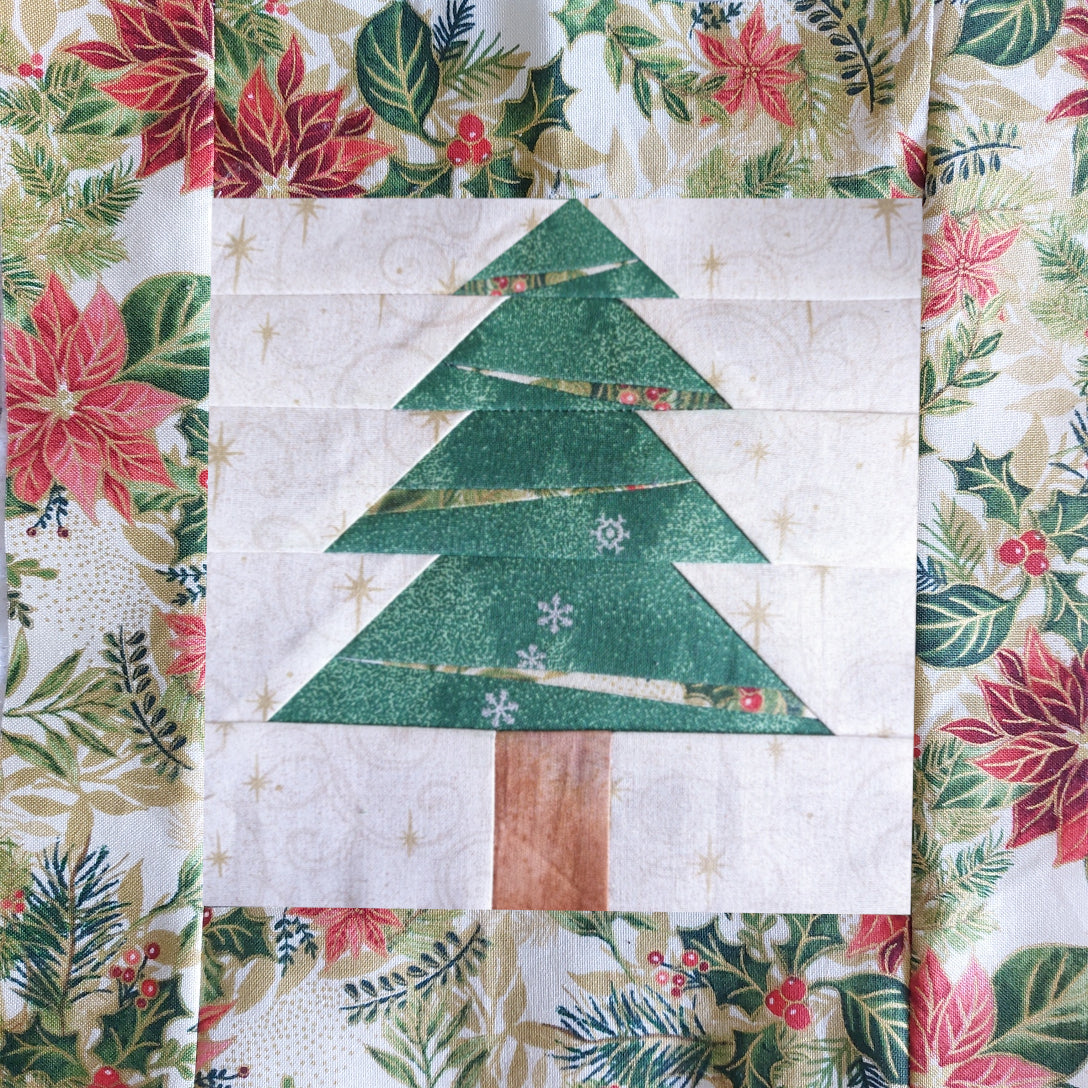 The Foundation Pieced Christmas tree framed with a Christmas fabric border - a quick and easy design