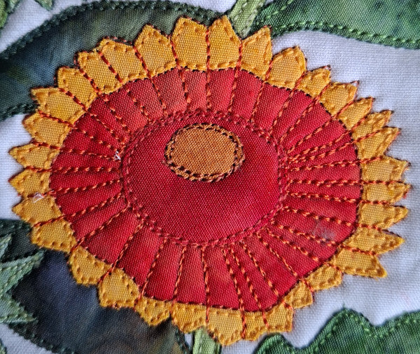 close up of Gaillardia flower with free-motion stitching