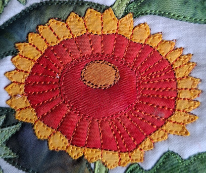 close up of Gaillardia flower with free-motion stitching