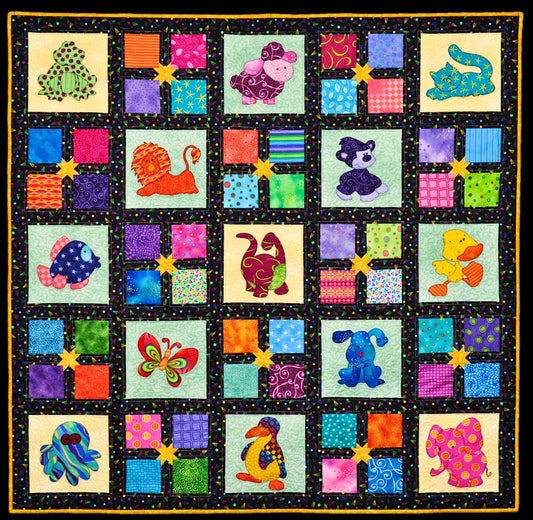 Animal Party quilt pattern by Jennifer Houlden. Blanket stitched applique with patchwork squares and sashing