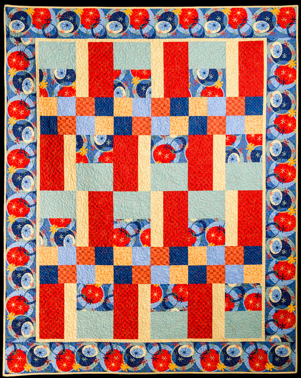 rectangles and squares baby patchwork quilt in blue and red colors