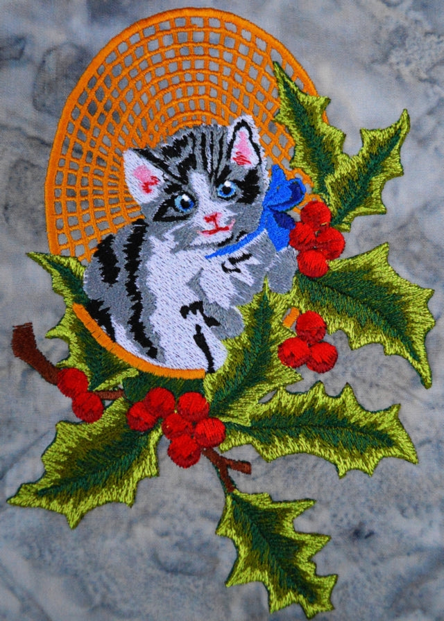 Downloadable Christmas embroidery of kitten in holly