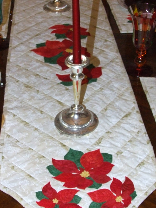 applique poinsettia table setting collection - quilt pattern available made and designed by Ruth Blanchet