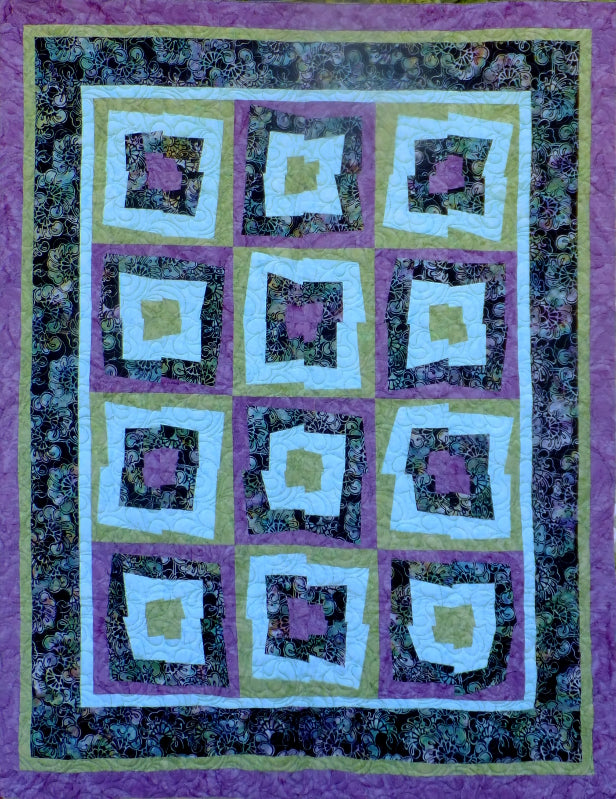 Time square quilt pattern is a twist on the traditional log cabin quilt block