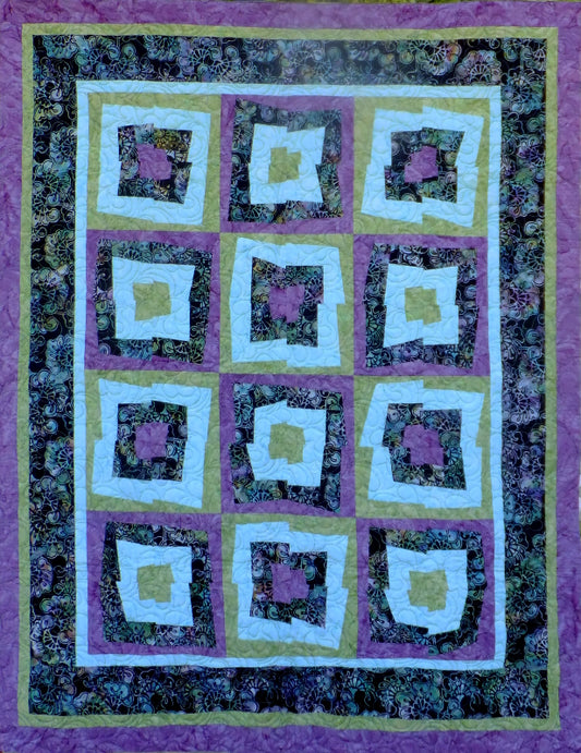 Time square quilt pattern is a twist on the traditional log cabin quilt block