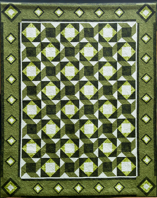 a green patchwork quilt pattern representing woven stars by Jennifer Houlden