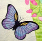 Close up of appliqued purple butterfly with yellow option of Ruth Blanchet's Spring Life quilt pattern