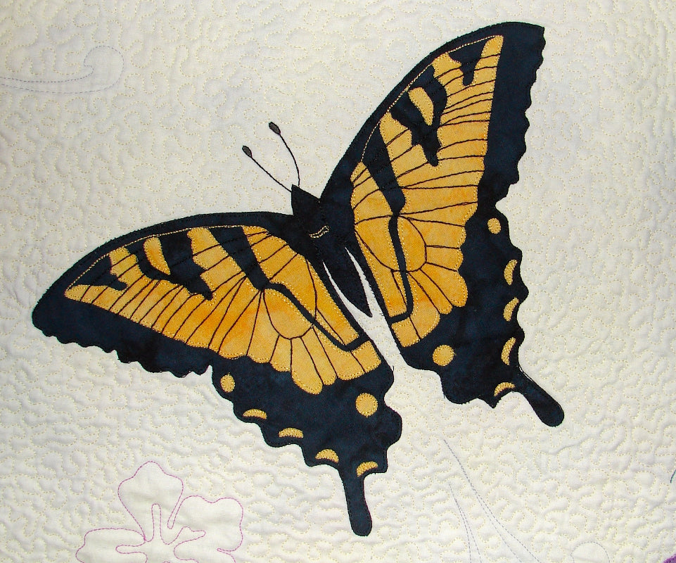 Single applique block pattern of yellow and black butterfly from Ruth Blanchet's Spring Life quilt pattern