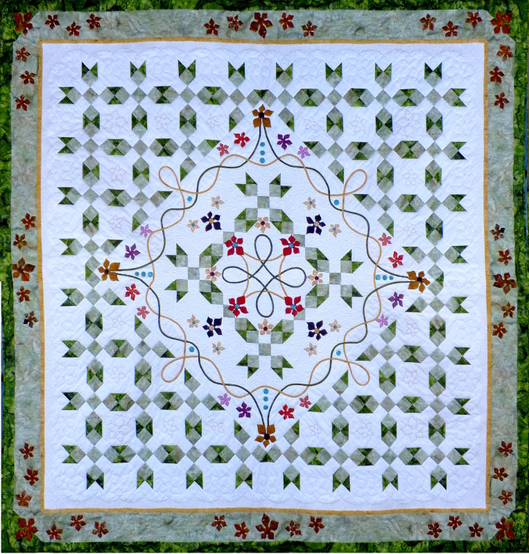 Celtic quilt pattern by Ruth Blanchet includes patchwork background and applique