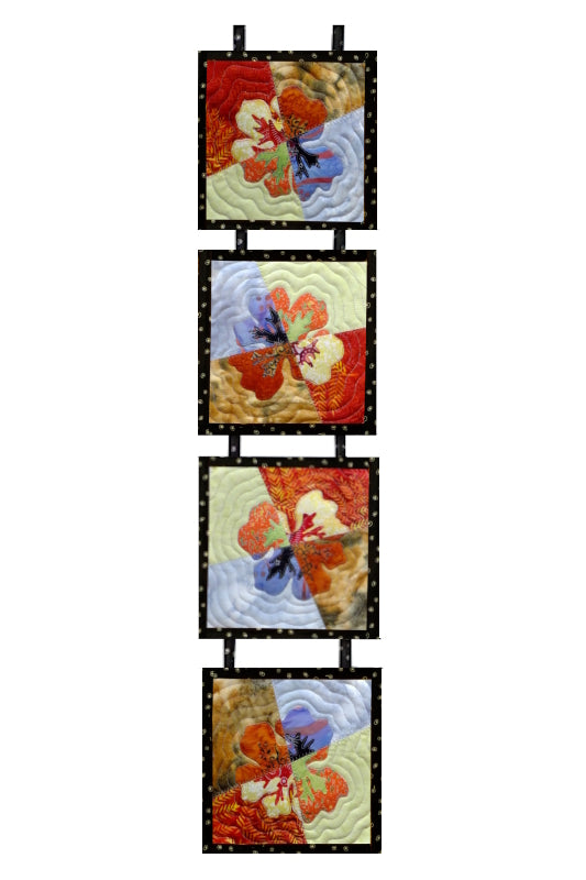 Colorful quilt block pattern with simple applique to create a decorative table runner or wall hanging