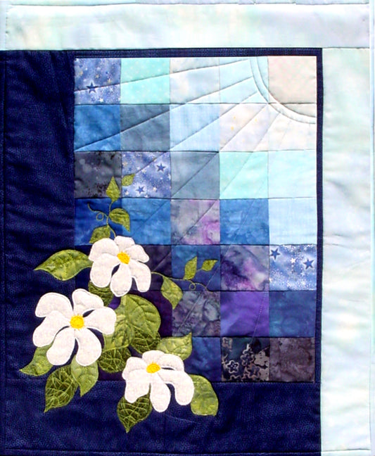 Clematis flower applique quilt pattern on a color wash background. An easy quick quilt pattern to make.
