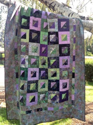 patchwork quilt pattern by Anita Eaton made of triangles and squares