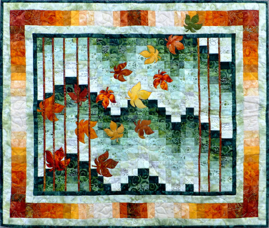fractured strips in a Fall Bargello quilt with applique leaves - quilt pattern available