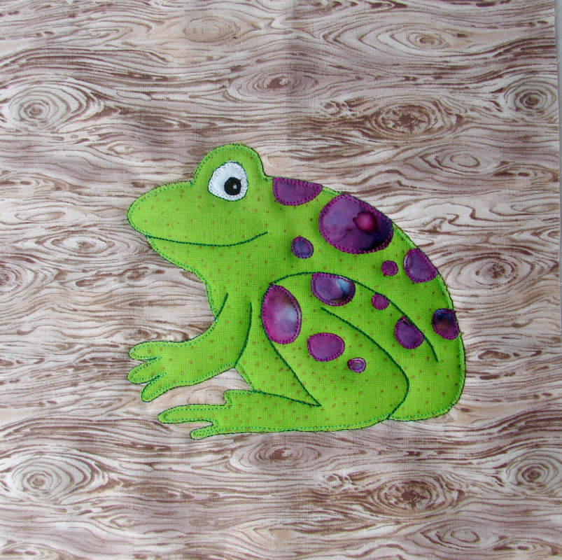 An animal quilt block of a frog designed for an animal quilt
