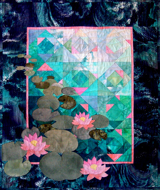 an applique lily pond quilt pattern with square in a square foundation pieced background