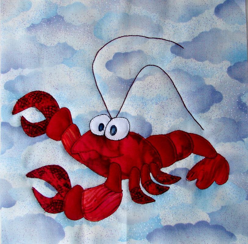 animal quilt block of an appliqued lobster designed for an animal quilt