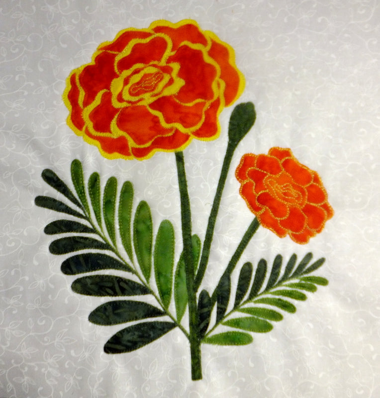applique marigold flower block pattern. 1 of more than 55 flower blocks by Ruth Blanchet
