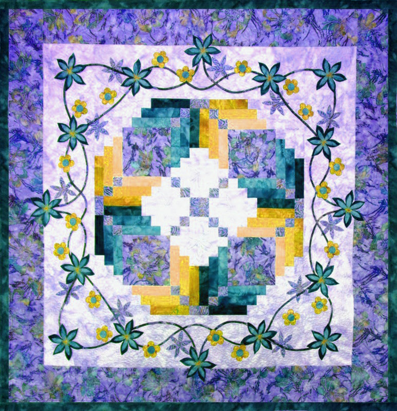A wreath of patchwork and applique using popular Hoffman fabrics