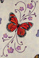 Central part of the Spring Life quilt shows appliqued hibiscus flower design and butterfly