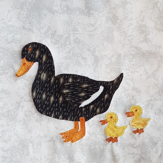 animal quilt block of a duck and two ducklings designed for an animal quilt